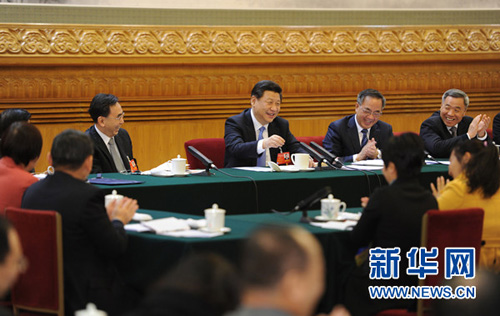 3月6日，中共中央總書記、國家主席、中央軍委主席習(xí)近平參加十二屆全國人大二次會議廣東代表團(tuán)的審議。 新華社記者謝環(huán)馳攝
